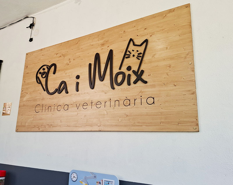 cartel madera entrada